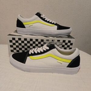 Vans Black and White Sneakers with Yellow Stripe